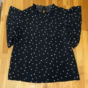 Elegant Black Blouse with White Accents